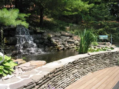 Pikesville Outdoor Kitchen — Landscape Design project by Honeysuckle Nursery & Design