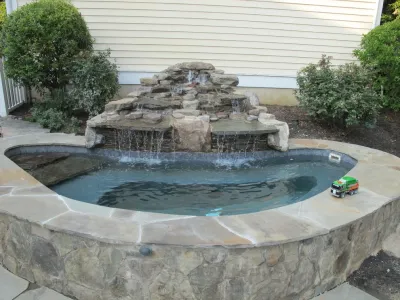 The Downs Estate Pool & Bar Area — Landscape Design project by Honeysuckle Nursery & Design in Hanover
