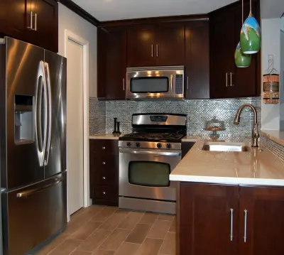 Nicole Drive Condo - Compact Transitional Kitchen by Laura Vlaming | Arkiteriors