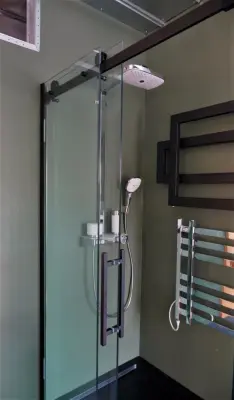 Novara Shower Door with Coordinating Floor and Additional Features by CityDesign