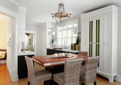 Contemporary Vintage Kitchen in Oak Park with Diverse Finishes by Denise Hauser Design Co.