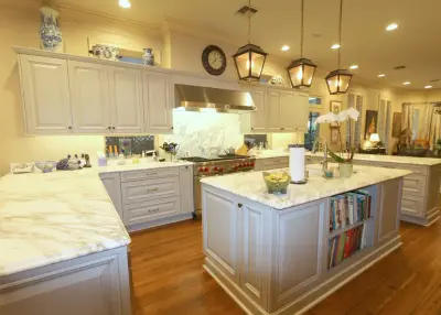 Pull-Out Pantry Design Enhances Storage in Wood-Mode Kitchen by Classic Cupboards, Inc