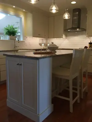 Elegant White Kitchen with Just the Right Touch of Sparkle by Stacey Kocevar Designs, LLC