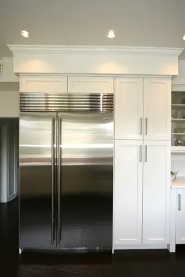 Modern Kitchen in Old Metairie Featuring Glass-Front Brookhaven Cabinets by Classic Cupboards, Inc