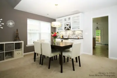 Shared Living-Dining Space by Designs By Ebony, LLC