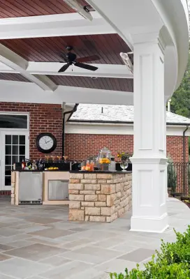 Stone and Stucco Patio Kitchen — Kitchen Remodeling project by Evalia Design, LLC.