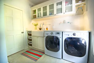 Laundry Storage Units by Finishing Touch Custom Woodworks, Inc.