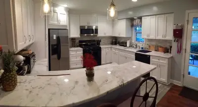 Pebble Creek Culinary and Lavatory by Dream Kitchen And Bath