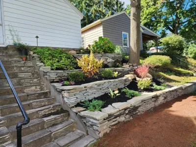 dry stacked wall — Landscape Design project by Aureli Landscaping & Custom Stone Work