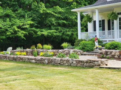 Terraced garden landscape — Landscape Design project by Aureli Landscaping & Custom Stone Work