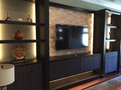Random Wave Walnut and Brown Ledge Rock Wall Unit by J2 Design Studio