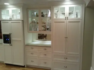 Aqua Corian with White Cabinets by Dimensions In Wood Inc