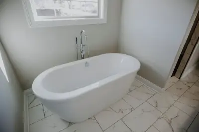 A tranquil primary bathroom ambiance by Corvin's Floor Coverings & Cabinetry