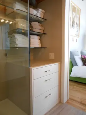 Compact Loft Bathroom by Cabinets By Design LLC