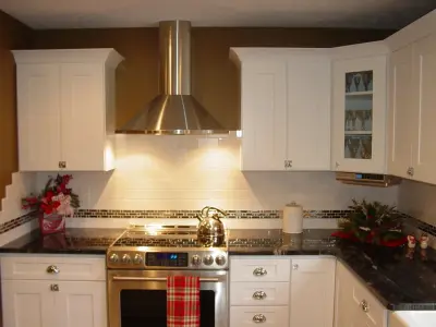 Elegant Kitchen Renovation by Solon White by Kitchen And Bath Etc.