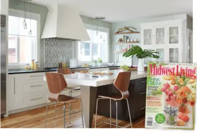 Transitional Kitchen in Oak Park Featuring a Spacious Island by Denise Hauser Design Co.