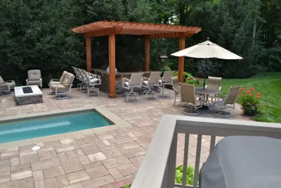 Award Winner! Best Before and After by Unilock — Landscape Design project by Engledow Estates