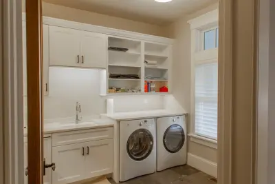 Chesapeake White Pantry and Laundry Area by Chris Van Genechten - Kitchen & Bath Design
