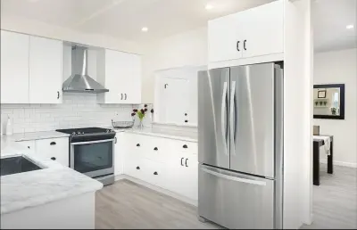 White Countertop Drawer Kitchen by Dream Kitchen And Bath