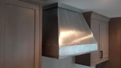 Zinc Canopies — Kitchen Remodeling project by Thomas McNeil Cabinetry