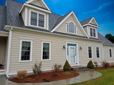 Everlast Composite Siding and Provia Doors in Millis, MA 02054 — Siding & Exterior Remodeling project by United Home Experts
