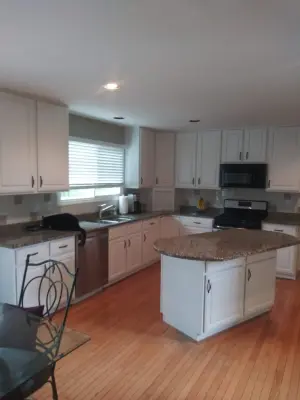 Refinished Kitchen Cabinet Project 2 — House Painting Services project by Tucker & Co. Painting LLC