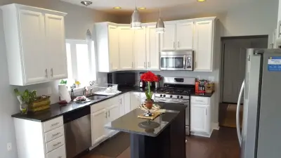 Rochester NY Kitchen Cabinet Painting — House Painting Services project by Red Truck Painting