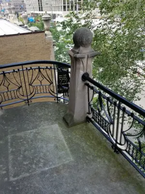 Refinishing balcony handrails in Lincoln Park by Windy City Painters