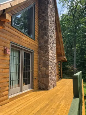 Log Cabin Transformation — House Painting Services project by Hawk Painters