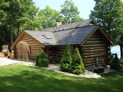 Log Cabin Repair and Upkeep — House Painting Services project by VIP Painting & Restoration
