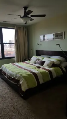 PRIMARY BEDROOM - wall covering.flooring.paint by Paint The Town Red - Color Consulting