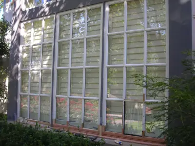 Wood Repair and Repainting of Midtown Tulsa Windows — House Painting Services project by Precise Home Specialties