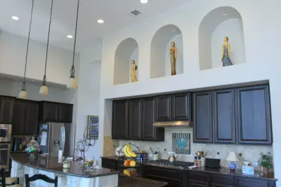Modern Living Room and Kitchen Paint in Driftwood, Texas by Matchless Interior Painting