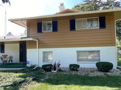Outdoor Painting for Brick and Wood Siding Including Garage — House Painting Services project by Victor's Home Services
