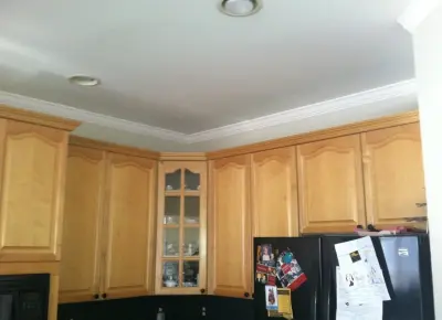 Refinished Kitchen Cabinets by Fox Brothers Painting