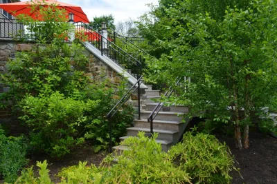 Renovated patio reveals the backyard! — Landscape Design project by GLDesigns in Ambler