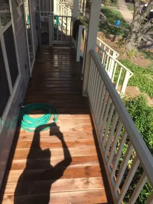 Porch Staining | Transformation Showcase — House Painting Services project by Sheldon And Sons Painting