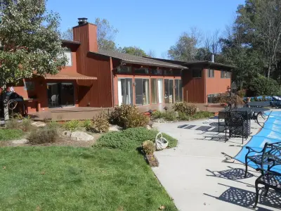 Outdoor Spaces: Decks, Porches, and Patios — House Painting Services project by Spectrum Coatings Company