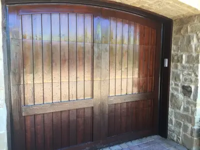 Restored Wooden Garage Door by Austin's Paint Guys