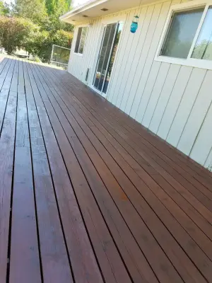 Deck Revitalization | Transformation Showcase — House Painting Services project by Southern Innovations Custom Painting