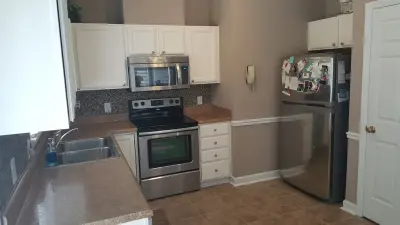 Cabinet Refinishing Project by Wallscapers Kitchen & Bath Innovations