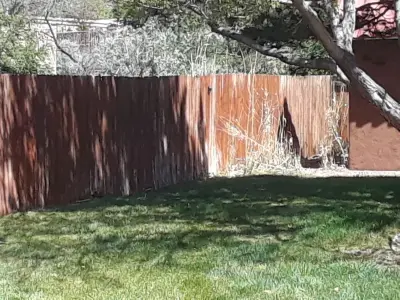Tarnished fence by Busby Finishes