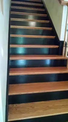 black-painted stairs — House Painting Services project by C&K Painting Services