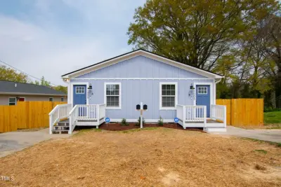 Linwood Reinvented: Trio of Contemporary Duplexes by Hykal Homes LLC