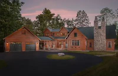 Lake Home Log — Design-Build Services project by Dickinson Homes