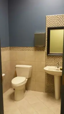Elegant Office Restroom by Midwest Remodeling