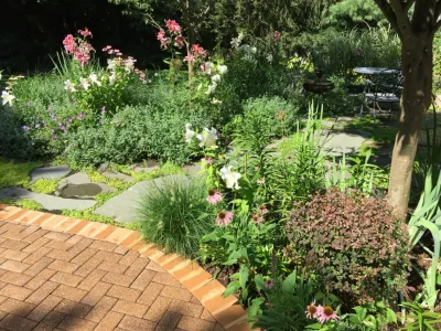 Khazzam Landscape Design LLC - Outdoor Lighting Installation in Dix Hills, NY
