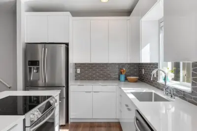 Contemporary Elegant Kitchens and Bathrooms by THE Remodel Group