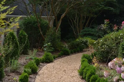 Southpark Outdoor Fireplace with Parterre Garden — Landscape Design project by Linda Greenberg Landscape & Design, LLC in Charlotte