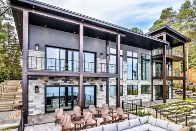 Contemporary Lakeside Retreat by Schultz Building Inc